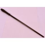 A mahogany velvet lined cased turned rosewood conductor's baton with tapering octagonal shaft and