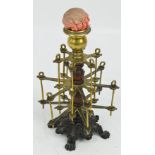 A Victorian bobbin stand with a two-tiered brass spiked section upon which the bobbins stand,