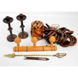 A small quantity of treen objects comprising a pair of knopped oak candlesticks,