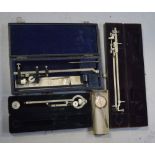 Three cased planimeters (used to calculate area), two A.G.