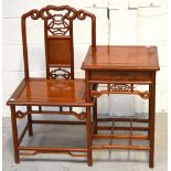 An Oriental hardwood telephone table, the chair with pierced splat, overall width 92cm.