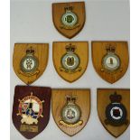 Seven various wooden shield-shaped military plaques to include six RAF examples (7).