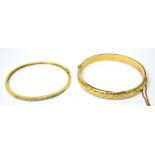 Two 9ct yellow gold bangles to include one example set with tiny diamonds, combined approx 17.1g.