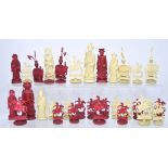 An early 19th century ivory chess set, one complete set natural, one set dyed red.