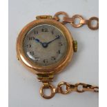 A 9ct rose gold ladies' wristwatch, dial set with Arabic numerals, London 1925,