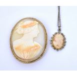 A 9ct yellow gold framed cameo brooch and a smaller white metal and marcasite cameo necklace (2).