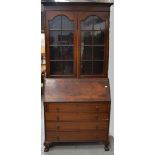 An Edwardian mahogany bureau bookcase,