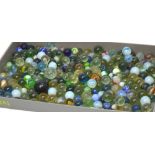 A varied selection of Victorian and later glass marbles and ollies.