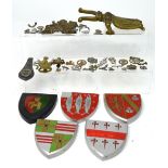 A quantity of military badges,