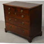 A George III mahogany two-over-three chest of drawers on bracket feet, width 102cm.