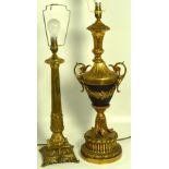 A brass table lamp with fluted column support,