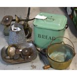 A 1950s green enamelled bread bin and cover,