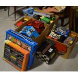 A large quantity of boxed and unboxed vehicles to include a Cararama 1:43 scale set,