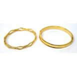 Two 9ct yellow gold bangles, approx combined 15.3g.
