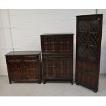 An Ercol style dining room suite comprising cocktail cabinet, width 83cm,