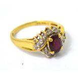 An 18ct yellow gold ruby and diamond ring, size K, approx 3.1g.