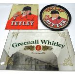 A Greenall & Whitley advertising mirror, 37 x 52cm, an acrylic advertisement for Tetley Bitter,