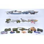 A quantity of playworn diecast vehicles to include two Dinky Corvettes, a Dinky Motor Patrol boat,