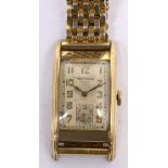 Waltham; a 1940s tank style gentlemen's watch, 10ct gold filled curvex style case,