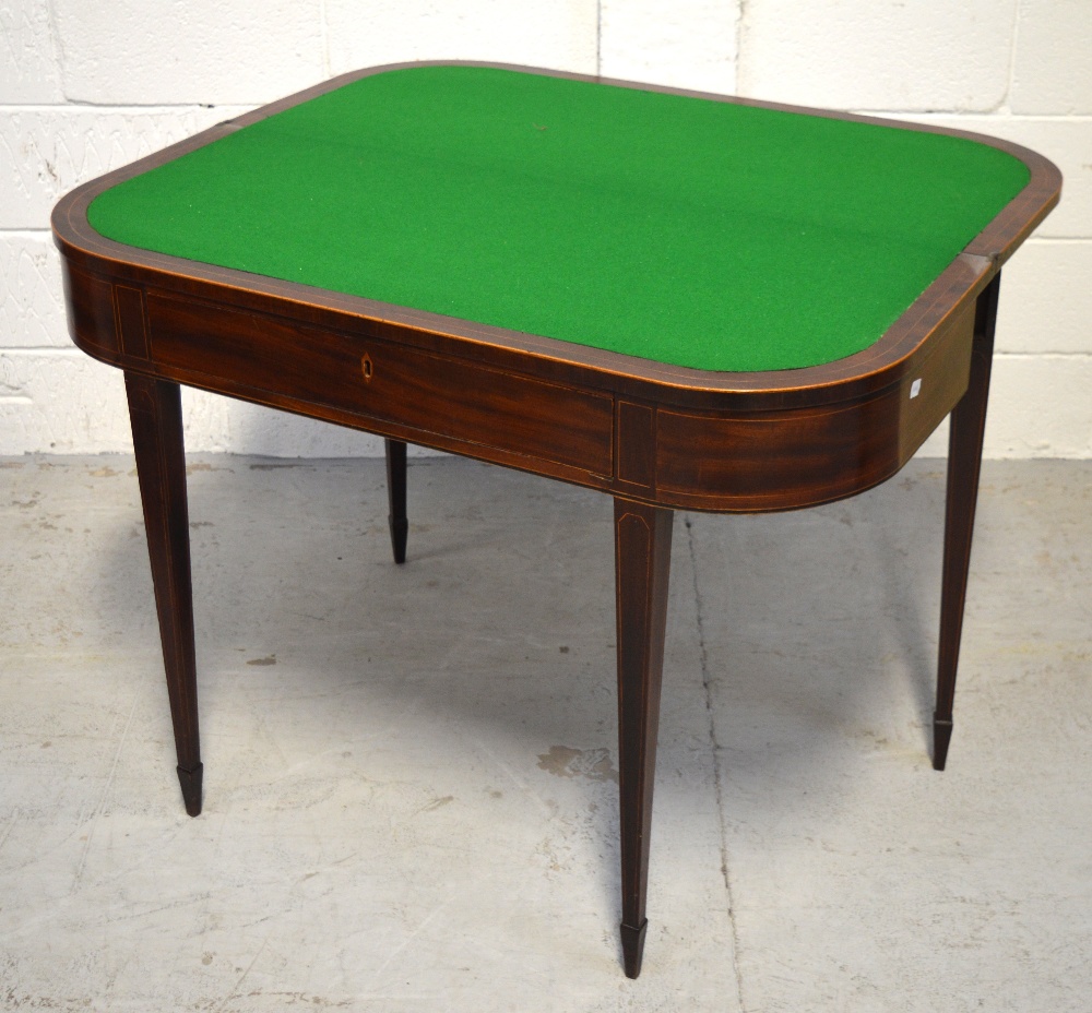 A 19th century mahogany inlaid fold-over card table on tapering supports and peg feet, - Image 2 of 2