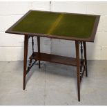 A reproduction mahogany side table with lower shelf on turned supports, on tapering splayed legs,