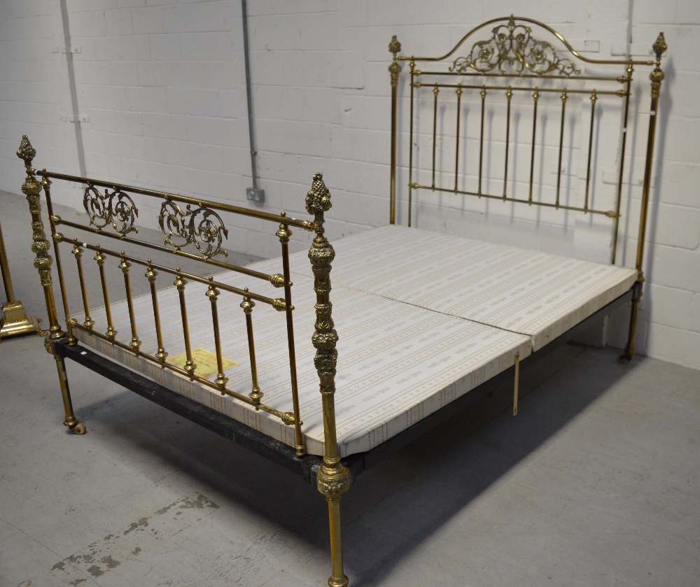 An Edwardian brass bed, with carved curved back rail with filigree work, - Image 2 of 2