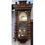 A Victorian Vienna eight day wall clock, movement by Gustav Becker with half-hour strike,