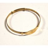 A babies' 9ct gold bangle, approx 2.3g.