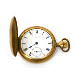 A gold-plated crown wind full hunter pocket watch, the dial set with Roman numerals,