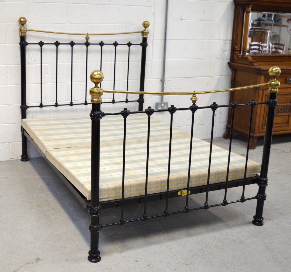 An ebonised brass 'Enchanted House' double bed, width 143cm.