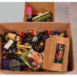 A quantity of boxed and unboxed vehicles to include Lledo, Days Gone, Matchbox, Corgi etc.