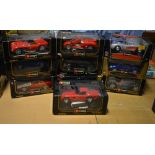 Ten boxed Burago 1:18 scale cars (10).