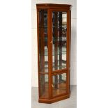 An Oriental hardwood framed glazed display cabinet with integral glass shelving, width approx 90cm.