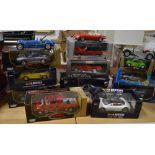 Eleven various boxed 1:18 and 1:24 scale cars and three unboxed Burago vehicles (14).