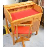 A retro Taylor of Leicester child's desk, width 70cm and swivel chair (2).