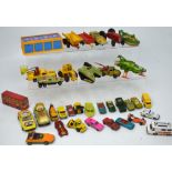 A collection of playworn diecast vehicles and a boxed Corgi Juniors Multi Garage.