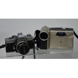 A Minolta cased camera and a Sharp Viewcam, various light meters etc.