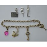 A Stirling silver 'Hot Diamonds' charm bracelet with additional charms in retail pouches.