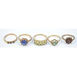 A group of five 9ct gold floral set dress rings.
