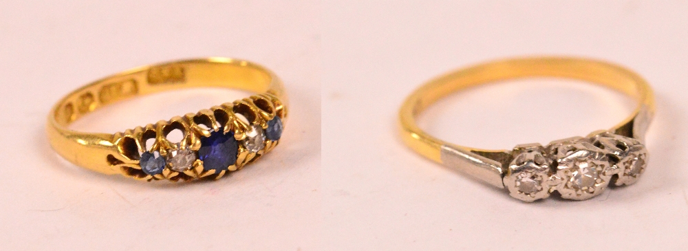 A Victorian 18ct yellow gold ring set with three graduated sapphires alternating with two diamonds,