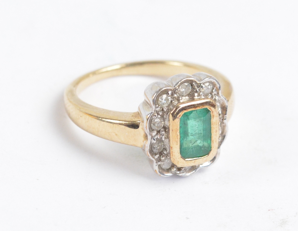 A 9ct yellow gold emerald and diamond floral set cluster ring,