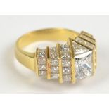An 18ct yellow gold quadrillion cut diamond cluster ring,