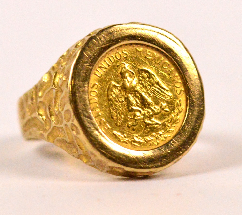 A Mexican two pesos coin, 1945, converted to a signet ring in 9ct yellow gold mount, size N, 4.