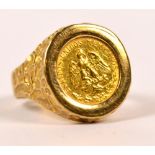 A Mexican two pesos coin, 1945, converted to a signet ring in 9ct yellow gold mount, size N, 4.