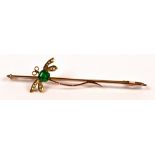 An Edwardian style 9ct gold dragonfly bar brooch set with an emerald body and seed pearl wings,