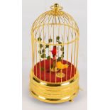 A modern musical automaton singing birdcage, height 27.5cm.