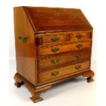 An early 20th century yew wood apprentice/miniature writing desk,