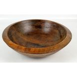 A 19th century rustic dairy bowl with bands of horizontal incised decoration to the exterior,