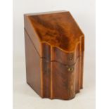 A George III mahogany satinwood crossbanded serpentine outlined knife box,