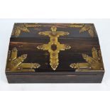 A good mid 19th century coromandel and brass strapwork decorated lap desk,